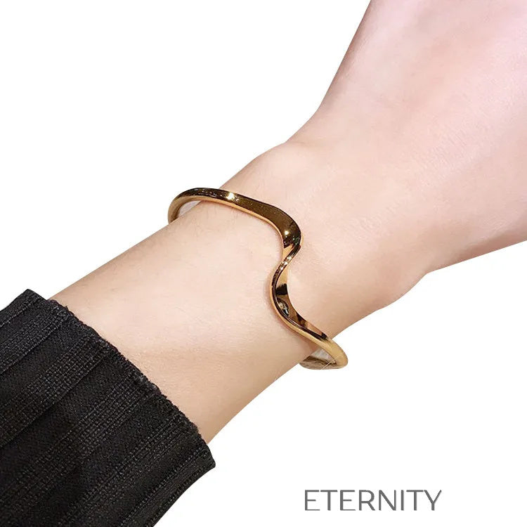 Brazalete Liquid Flow Ondulado Brazaletes Dorado Unica Acero Inoxidable ETERNITY