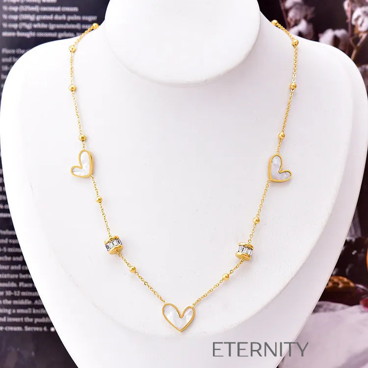 Collar Luminous Heart con Corazones de Nácar y Cilindros de Cristal Cadenas Dorado Unica Acero Inoxidable ETERNITY