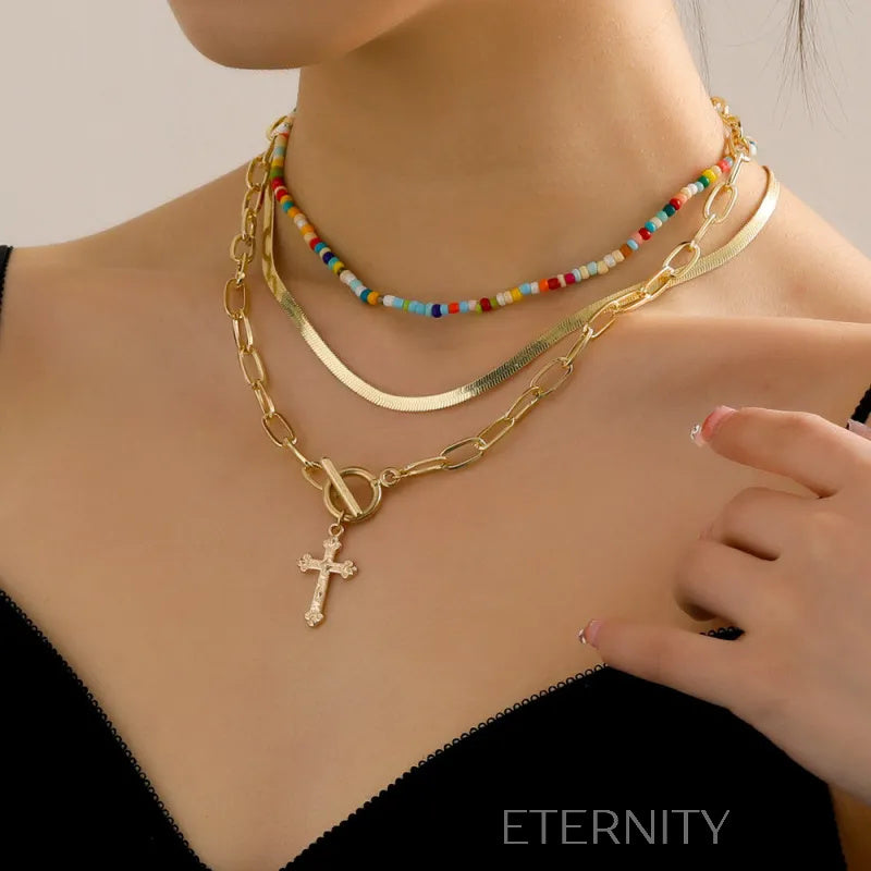 Set de collares dorados y de cuentas en capas con cruz Cadenas Dorado Unica Acero Inoxidable ETERNITY