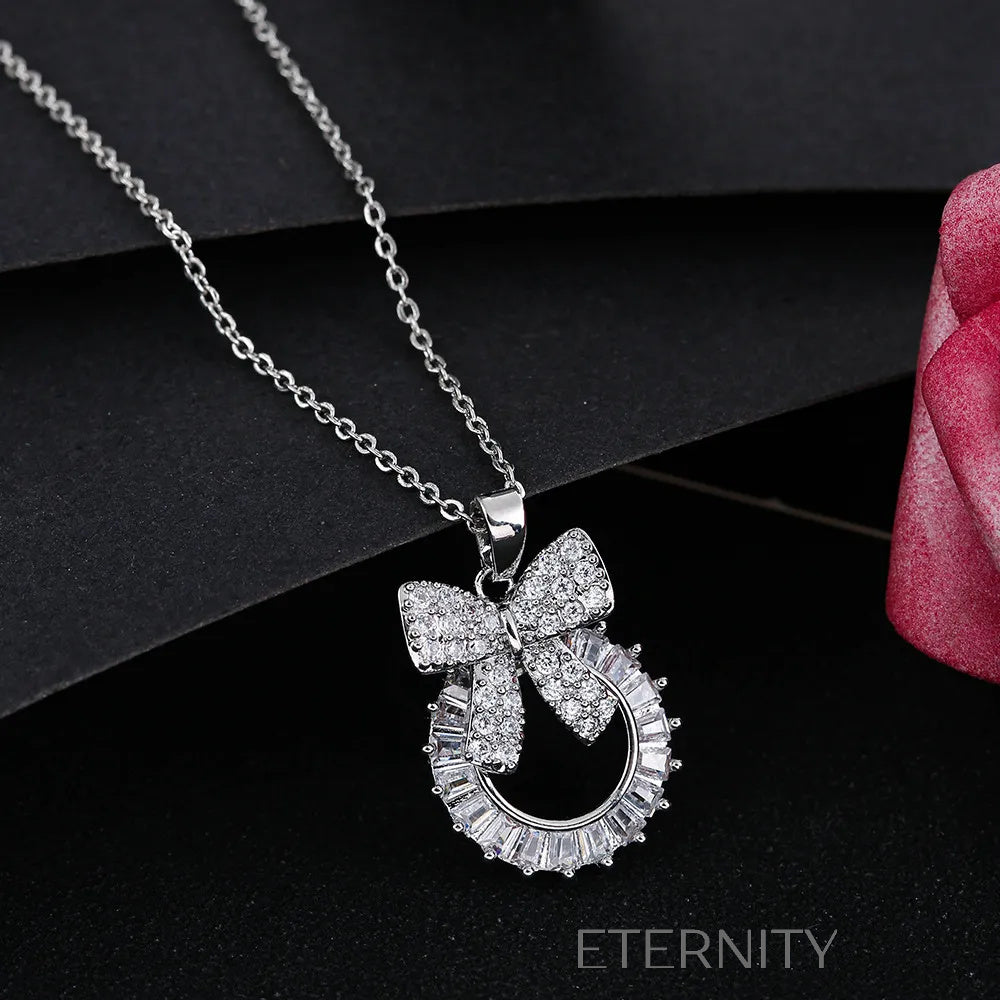 Set de Joyería Glitter Bow con Cristales y Diseño de Lazo Set Plateado Unica Acero Inoxidable ETERNITY