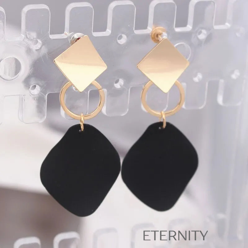 Aretes negro blanco rojo y verde con diseño artístico Zarcillos Negro Unica Acero Inoxidable ETERNITY