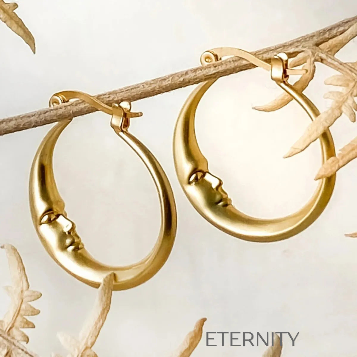 Aretes dorados y plateados en forma de luna creciente con diseño artístico Zarcillos Dorado Unica Acero Inoxidable ETERNITY