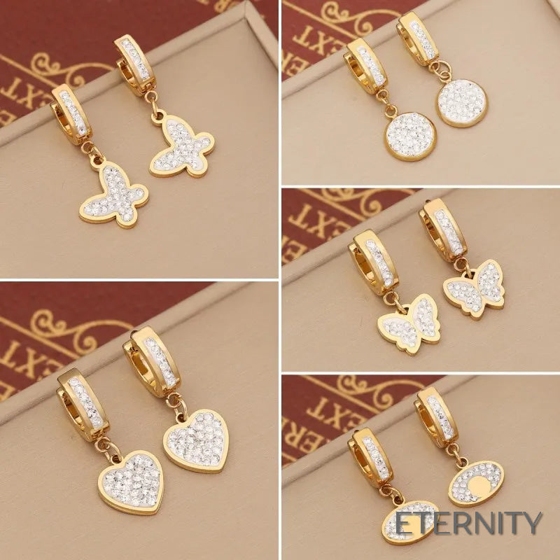 Zarcillos Colgantes Dorados con Dijes Brillantes de Mariposa, Corazón y Círculo - ETERNITY