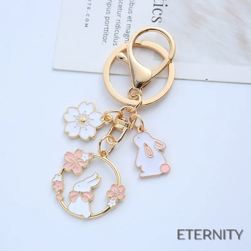 Adorables Llaveros Femeninos con Diseño de Conejito y Flores - ETERNITY