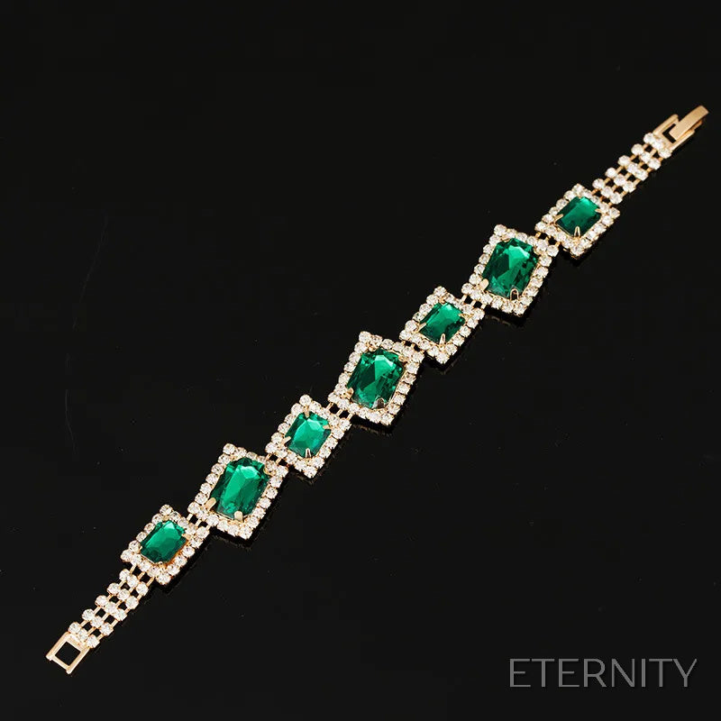Pulsera Femenina Dorada con Gemas Verdes Esmeralda y Detalles Brillantes - ETERNITY