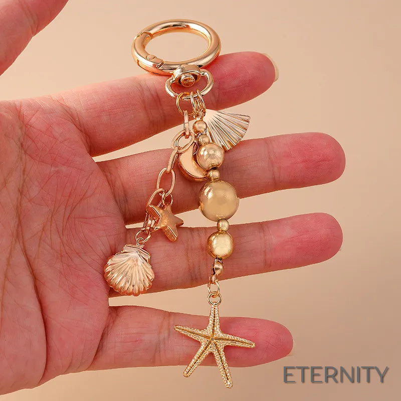 Llavero Creativo de Moda para Mujer con Estrella y Estrella de Mar