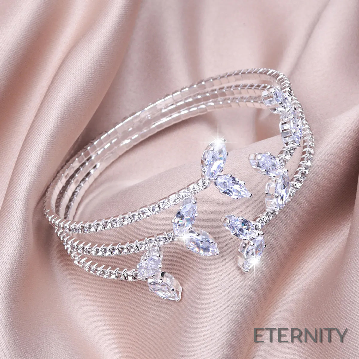 Pulsera Plateada Elástica con Diseño de Hojas y Cristales Luminosos - ETERNITY