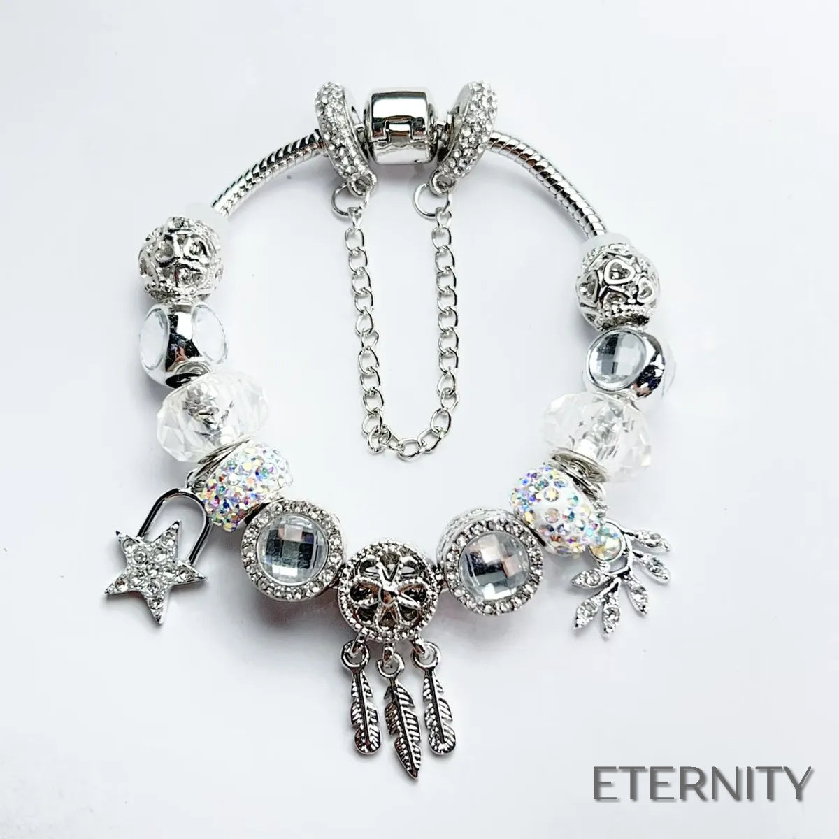 Brazalete Plateado Estilo Pandora con Dijes de Atrapasueños, Estrella y Corazón Alado - ETERNITY