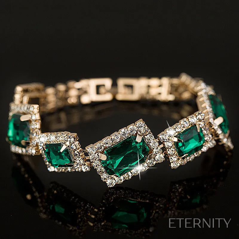 Pulsera Femenina Dorada con Gemas Verdes Esmeralda y Detalles Brillantes - ETERNITY