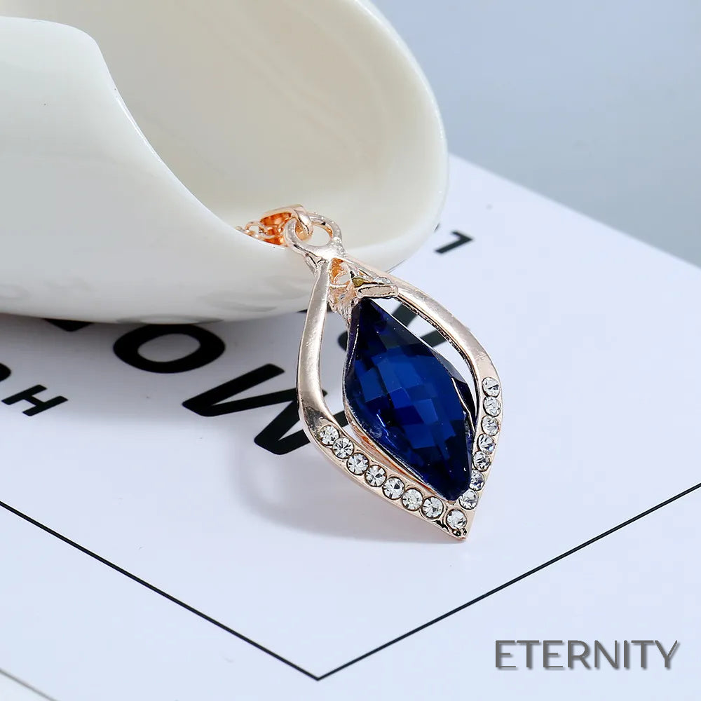 Set de Collar y Pendientes con Diseño Geométrico y Cristal Azul - ETERNITY