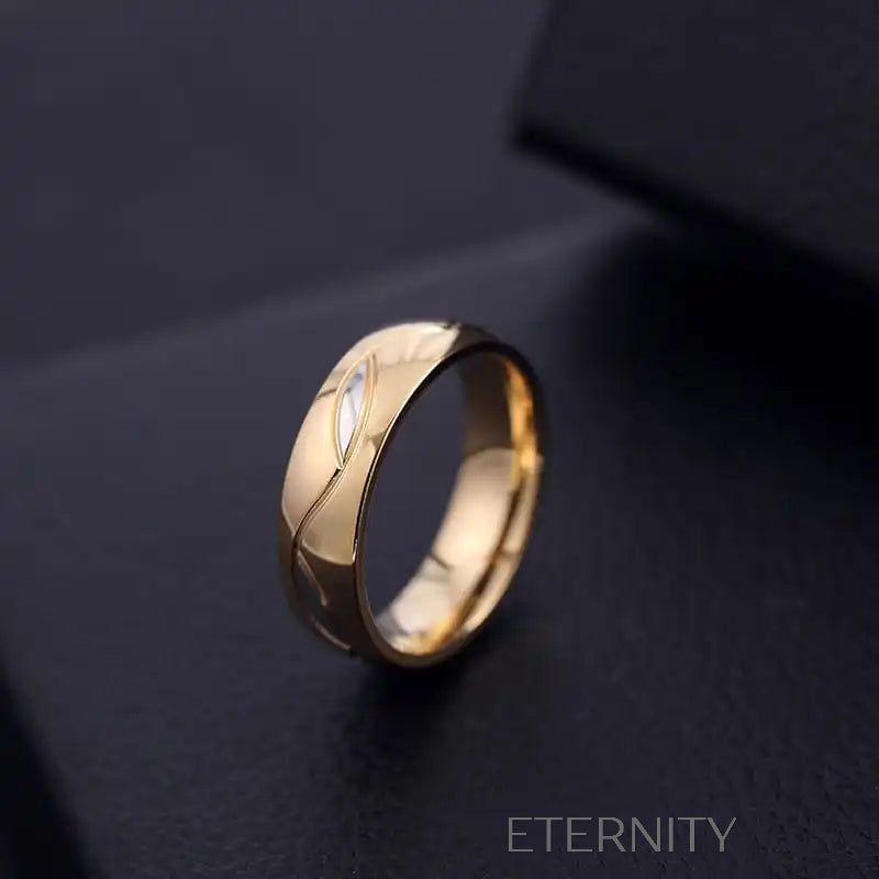 Anillo dorado con diseño de hoja y cristales brillantes Anillos Dorado 7 Acero Inoxidable  ETERNITY