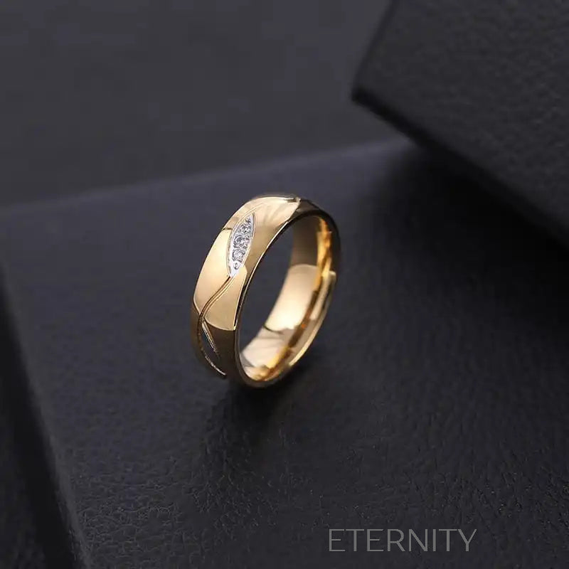 Anillo dorado con diseño de hoja y cristales brillantes Anillos Dorado 7 Acero Inoxidable  ETERNITY