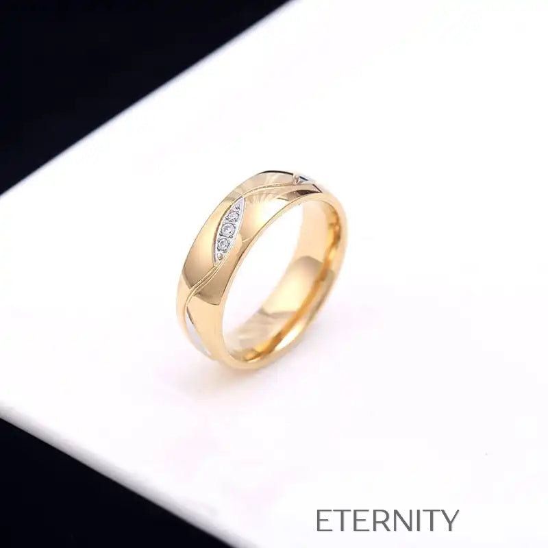 Anillo dorado con diseño de hoja y cristales brillantes Anillos Dorado 7 Acero Inoxidable  ETERNITY