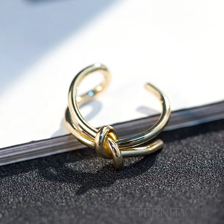 Anillo Entwined Unity con Diseño de Nudo y Doble Banda  Anillos Dorado Unica Acero Inoxidable  ETERNITY