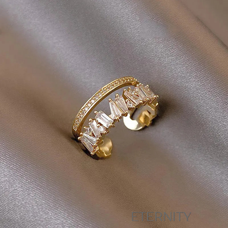 Anillo dorado con doble fila de cristales baguette y redondos Anillos Dorado Ajustable Acero Inoxidable  ETERNITY
