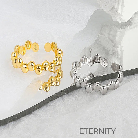 Brazalete Golden Pebble Orgánico  Anillos Dorado Ajustable Acero Inoxidable  ETERNITY