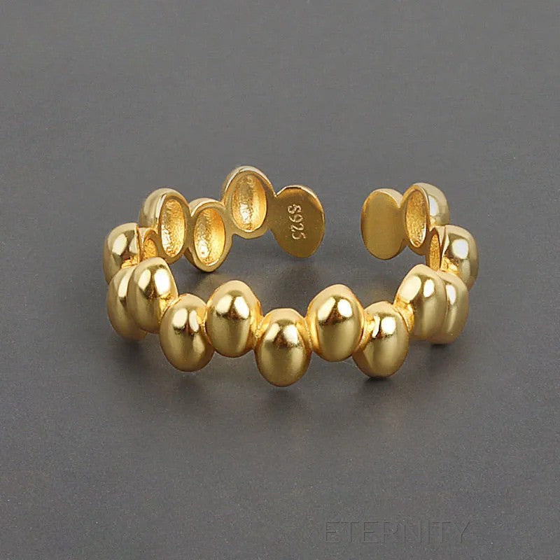 Brazalete Golden Pebble Orgánico  Anillos Dorado Ajustable Acero Inoxidable  ETERNITY