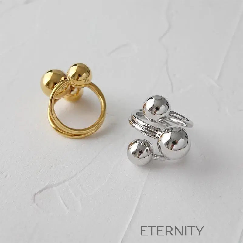 Anillo Ajustable Sphere Orbit de Diseño Escultórico en Oro y Plata  Anillos Dorado Ajustable Acero Inoxidable  ETERNITY