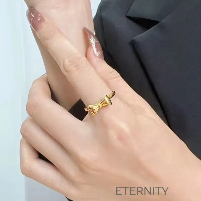 Anillo Fino Sweet Bow con Diseño de Lazo en Oro Pulido  Anillos Dorado 7 Acero Inoxidable  ETERNITY