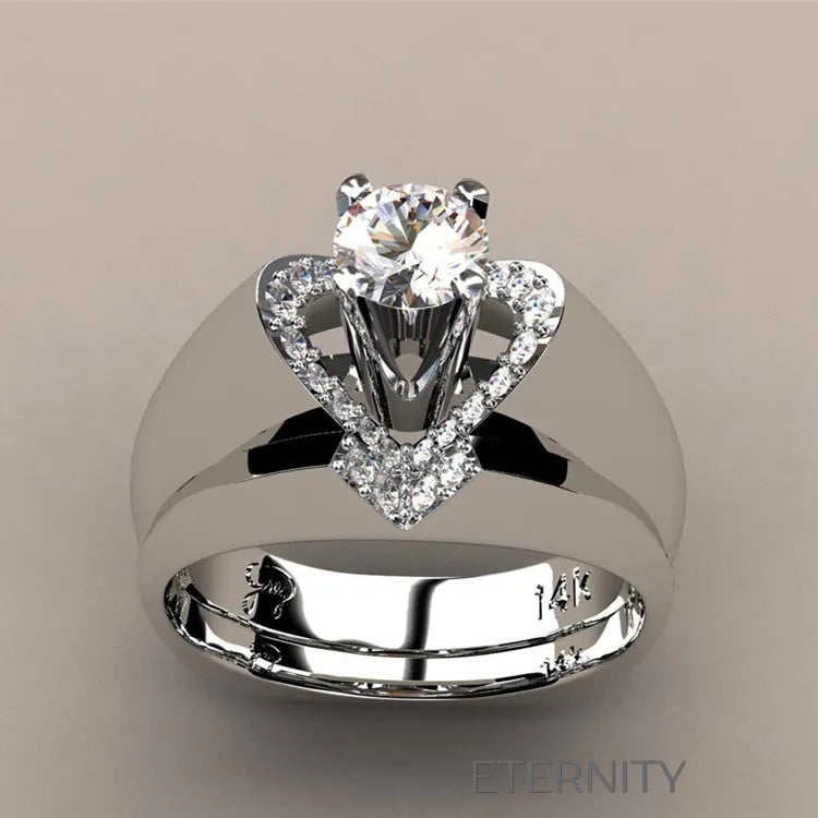 Anillo de compromiso con diamante central y diseño de corazón Anillos Plateado 7 Acero Inoxidable  ETERNITY