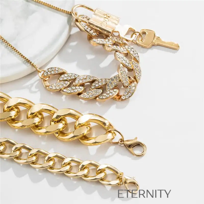 Set de Brazaletes de Cadena Gruesa en Oro con Detalles de Cristales  Brazaletes Dorado Unica Acero Inoxidable  ETERNITY