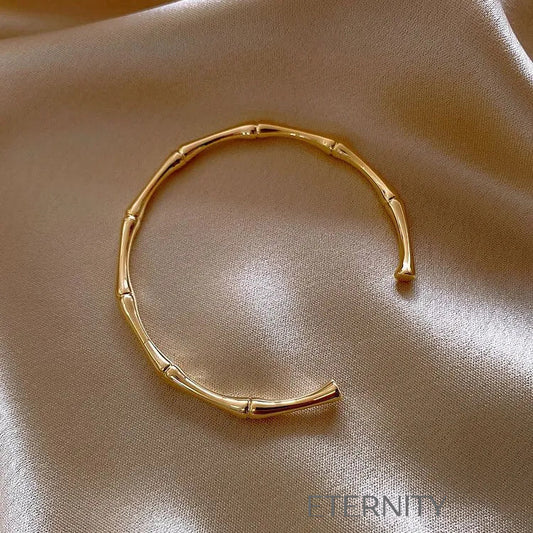 Brazalete Abierto Bamboo Path Orgánico  Brazaletes Dorado Unica Acero Inoxidable  ETERNITY