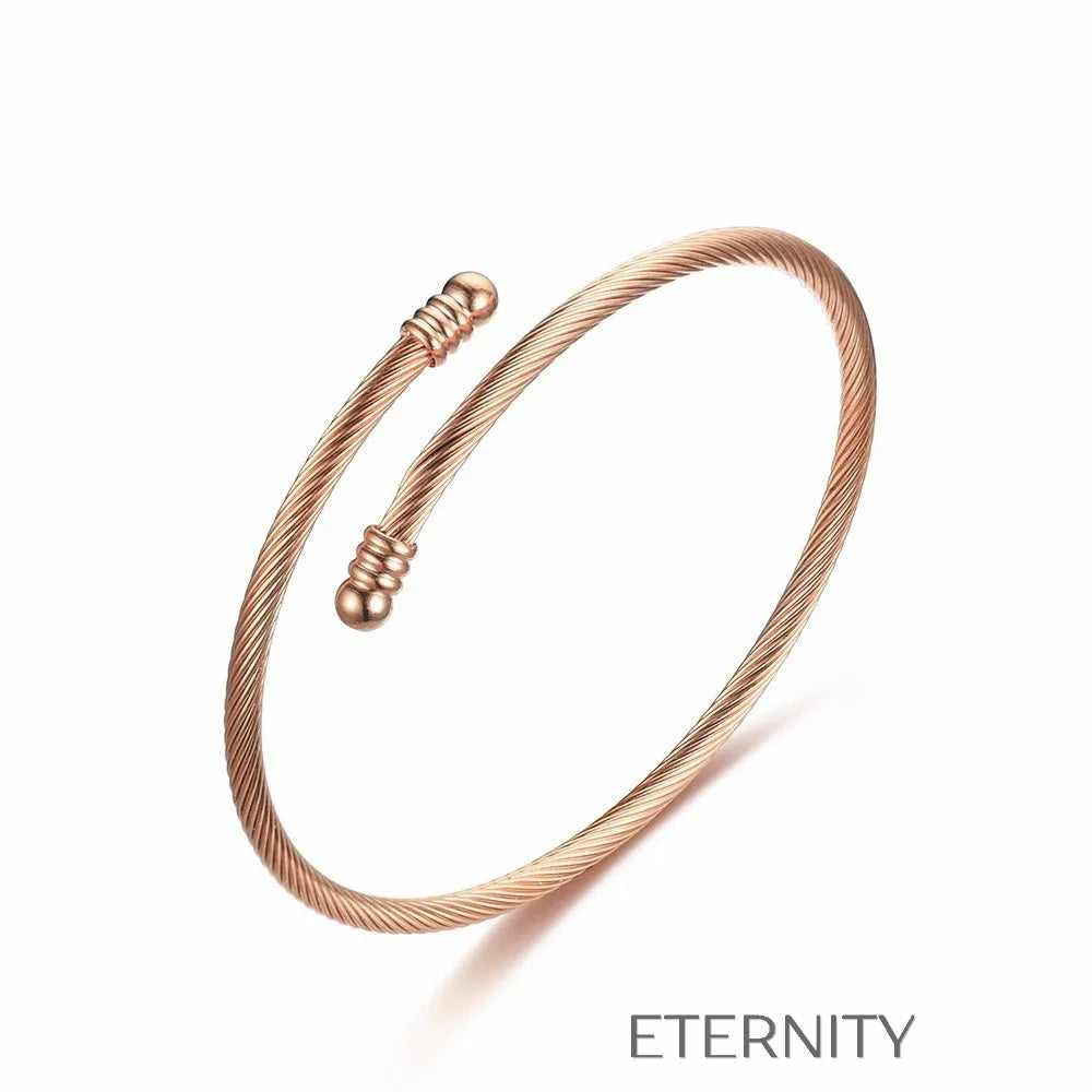 Brazaletes abiertos en cable metálico dorado plateado y rosado Brazaletes Dorado Unica Acero Inoxidable  ETERNITY
