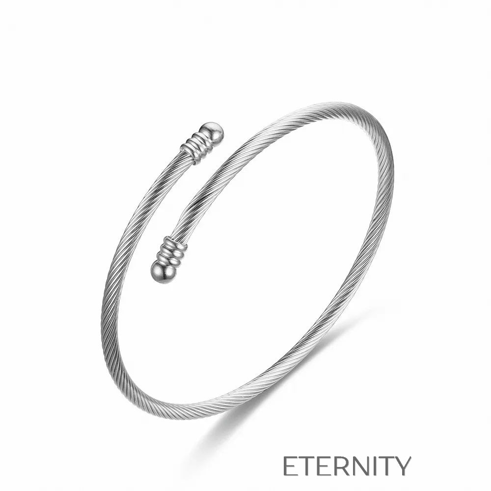 Brazaletes abiertos en cable metálico dorado plateado y rosado Brazaletes Dorado Unica Acero Inoxidable  ETERNITY