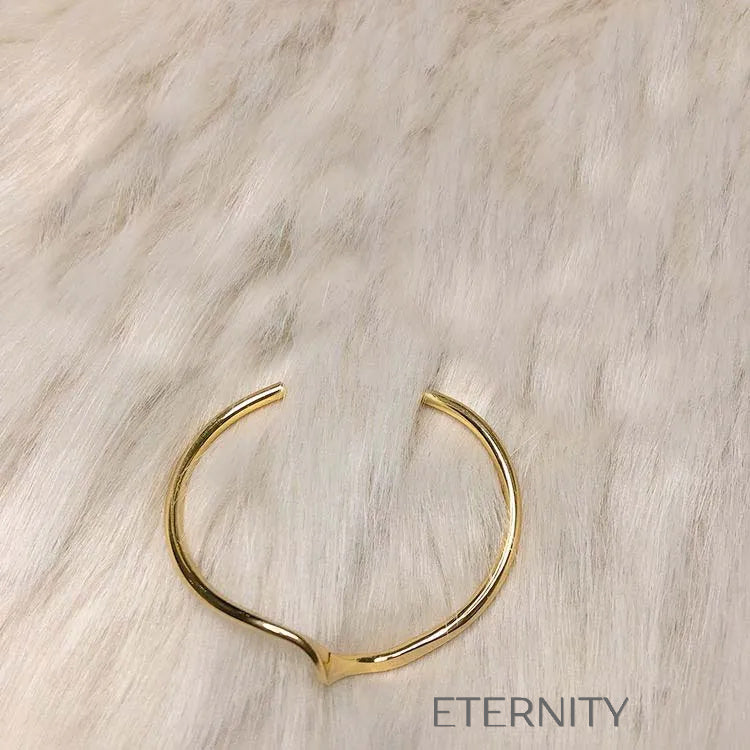 Brazalete Liquid Flow Ondulado  Brazaletes Dorado Unica Acero Inoxidable  ETERNITY