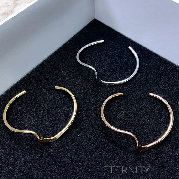 Brazalete Liquid Flow Ondulado  Brazaletes Dorado Unica Acero Inoxidable  ETERNITY