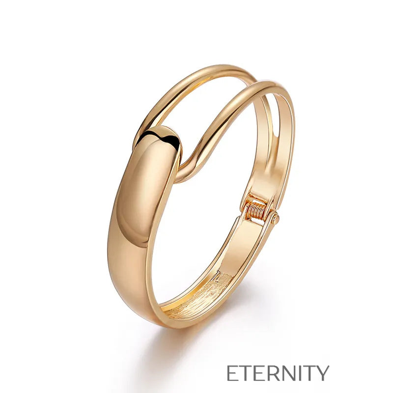 Brazalete Rígido Unity Loop con Diseño Orgánico y Cierre de Bisagra  Brazaletes Dorado Unica Acero Inoxidable  ETERNITY