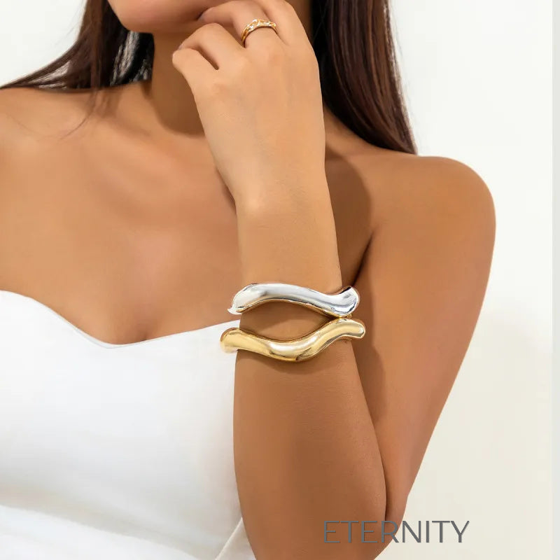 Brazalete Rígido Fluid Organic de Acero  Brazaletes Dorado Unica Acero Inoxidable  ETERNITY