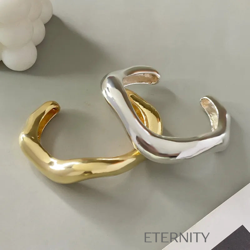 Brazalete Rígido Fluid Organic de Acero  Brazaletes Dorado Unica Acero Inoxidable  ETERNITY
