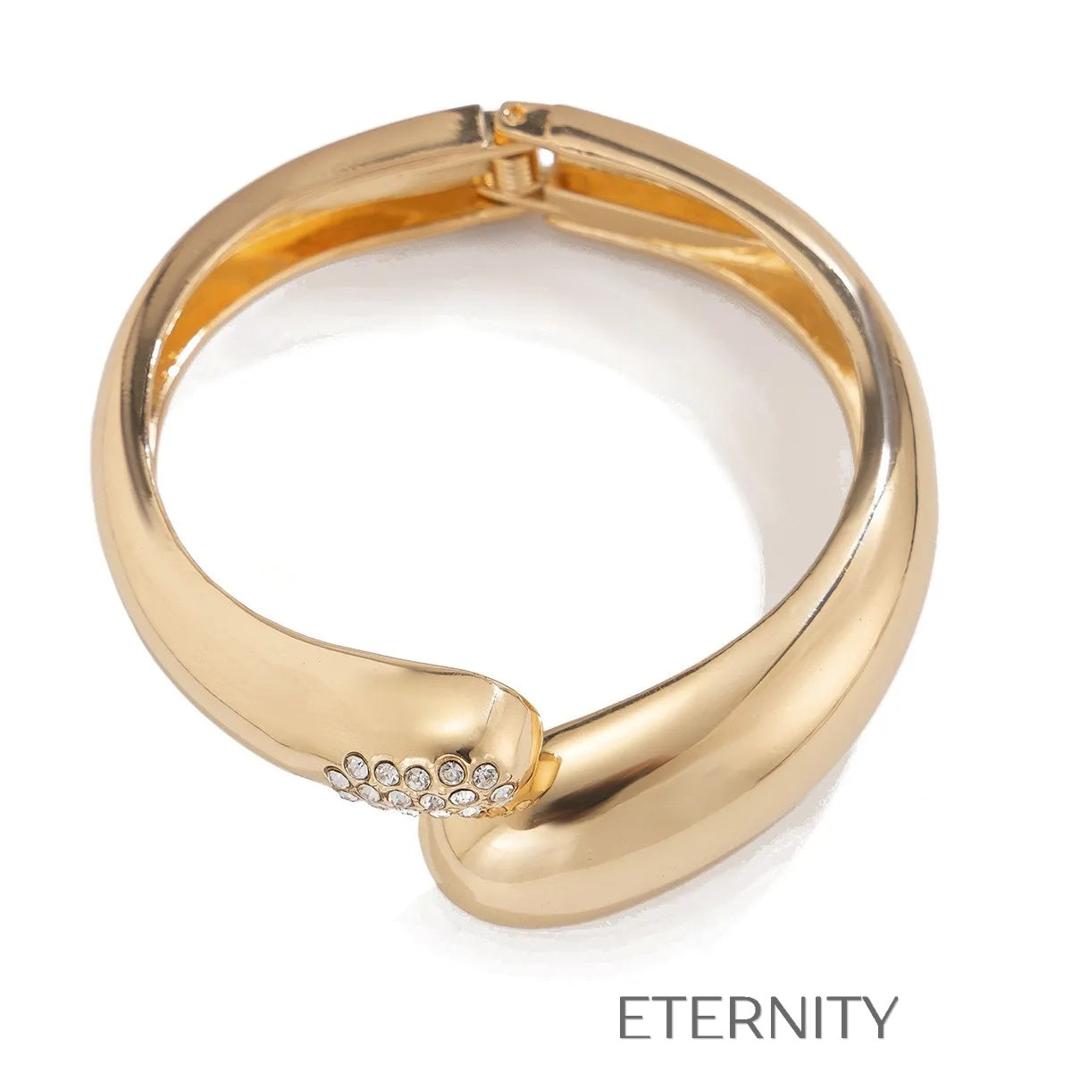 Brazaletes dorados y plateados con diseño escultórico moderno Brazaletes Dorado Unica Acero Inoxidable  ETERNITY