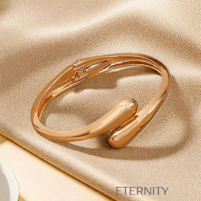 Brazalete Liquid Wrap Minimalista  Brazaletes Dorado Unica Acero Inoxidable  ETERNITY