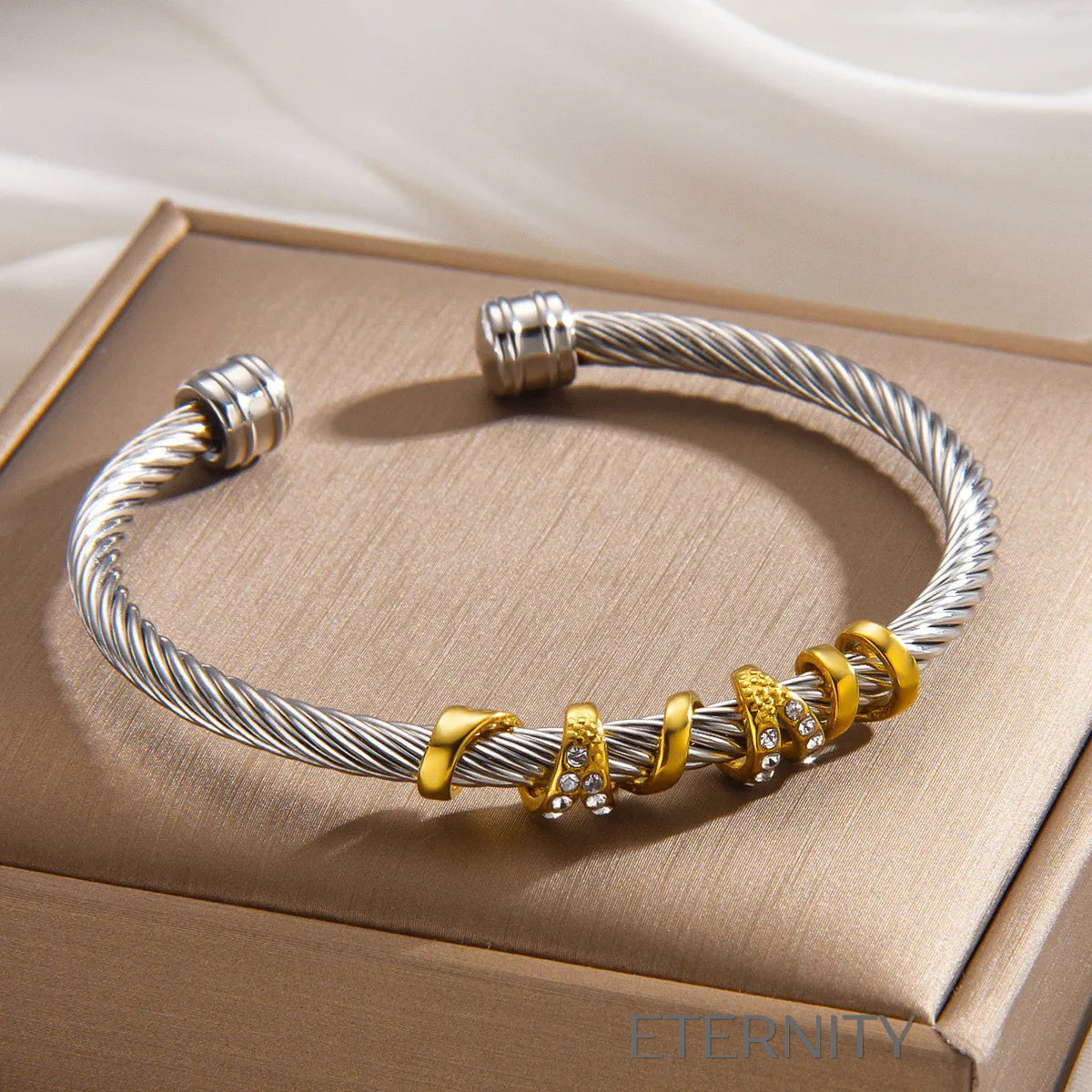 Brazaletes de Cable Trenzado con Detalles en Oro y Plata  Brazaletes Dorado Unica Acero Inoxidable  ETERNITY