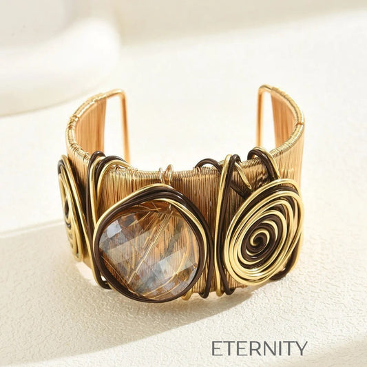 Brazalete Ethereal Spiral de Alambre Dorado y Piedra Central  Brazaletes Negro Unica Acero Inoxidable  ETERNITY