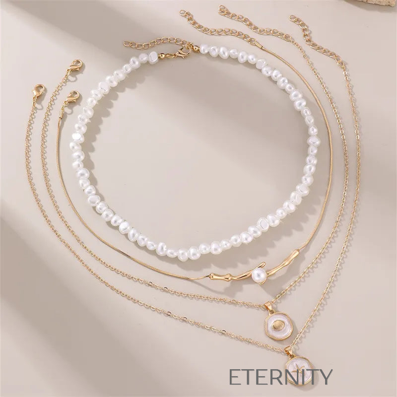 Set de Collares Pearl & Heart en Capas  Cadenas Dorado Unica Acero Inoxidable  ETERNITY