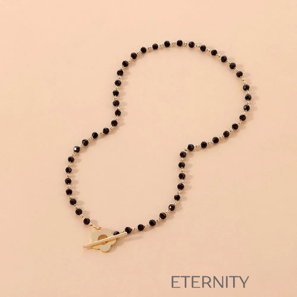 Gargantilla Flower Toggle de Cuentas Negras con Cierre Frontal de Flor en Oro y Plata  Cadenas Dorado Unica Acero Inoxidable  ETERNITY