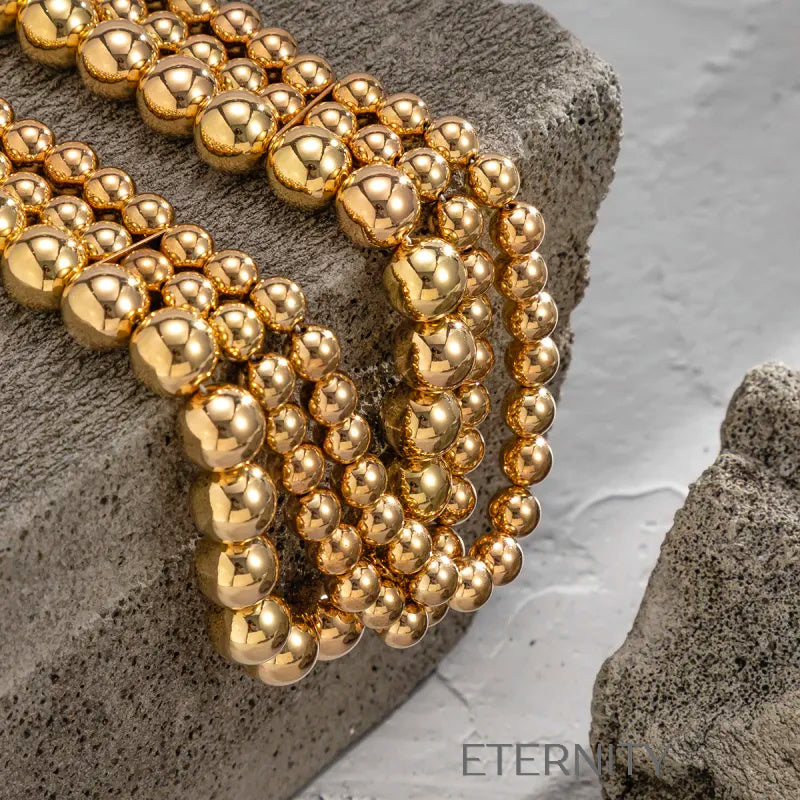 Collar Golden Sphere Multicapa  Cadenas Dorado Unica Acero Inoxidable  ETERNITY