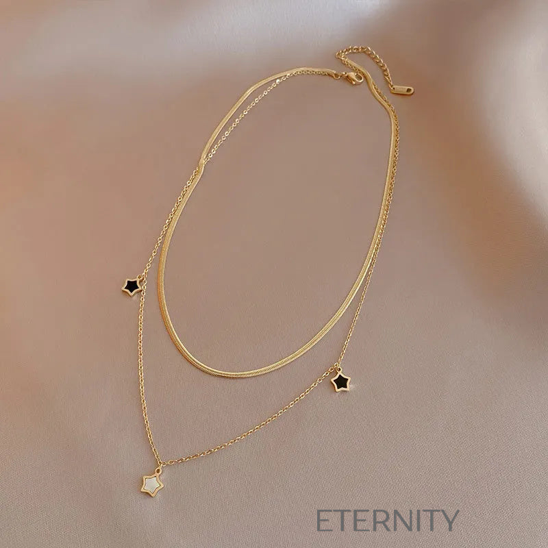 Set de Collar de Capas y Pulsera Cosmic Star en Oro con Dijes de Estrella  Cadenas Dorado Unica Acero Inoxidable  ETERNITY