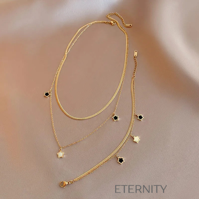 Set de Collar de Capas y Pulsera Cosmic Star en Oro con Dijes de Estrella  Cadenas Dorado Unica Acero Inoxidable  ETERNITY