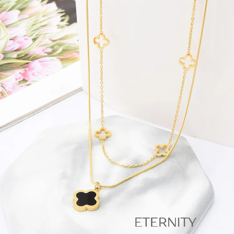 Collar Doble Eternal Lucky Clover en Oro con Esmalte Negro  Cadenas Dorado Unica Acero Inoxidable  ETERNITY