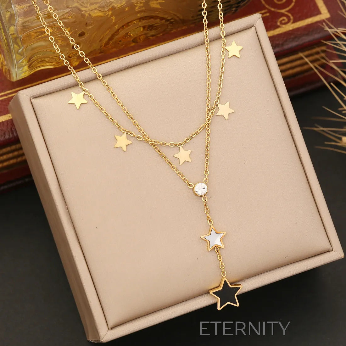 Collar Stellar Cascade Estrellas y Cristal  Cadenas Dorado Unica Acero Inoxidable  ETERNITY