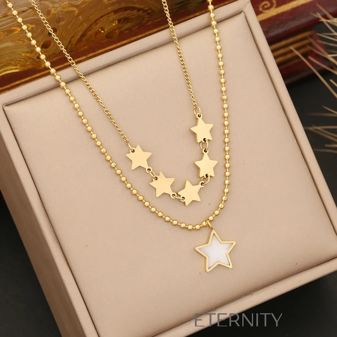 Collar Stellar Cascade Estrellas y Cristal  Cadenas Dorado Unica Acero Inoxidable  ETERNITY