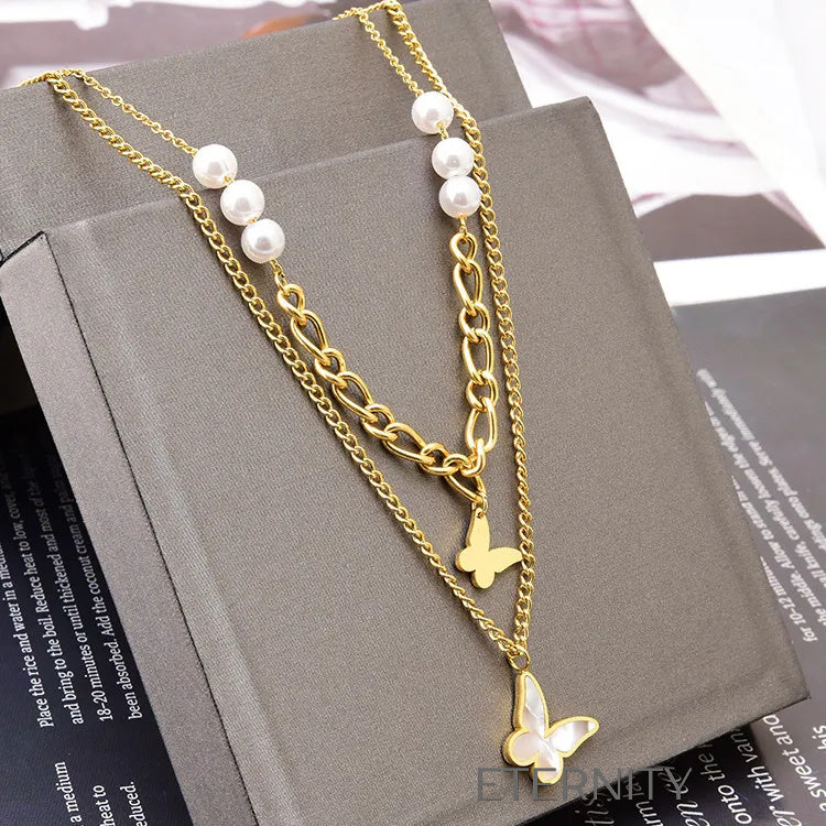 Collar Doble Nymph Pearl con Mariposas y Perlas  Cadenas Dorado Unica Acero Inoxidable  ETERNITY