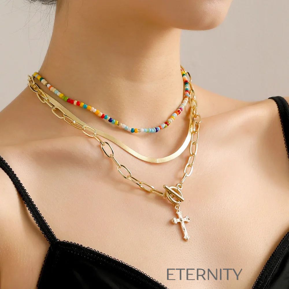 Set de collares dorados y de cuentas en capas con cruz Cadenas Dorado Unica Acero Inoxidable  ETERNITY
