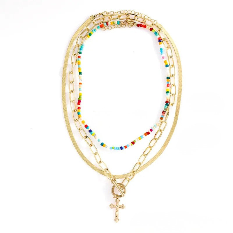 Set de collares dorados y de cuentas en capas con cruz Cadenas Dorado Unica Acero Inoxidable  ETERNITY