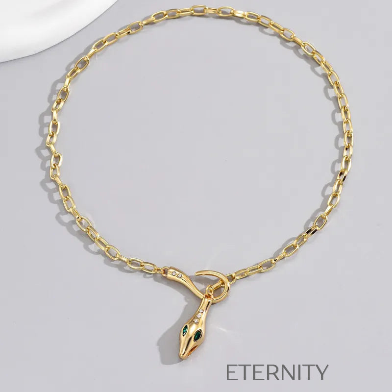 Collar Serpent’s Gaze con Eslabones y Dije de Serpiente con Cristales  Cadenas Dorado Unica Acero Inoxidable  ETERNITY