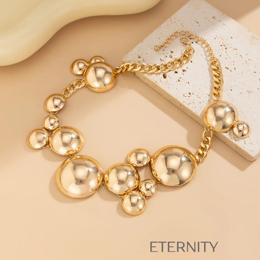 Collar de Impacto Celestial Orb con Esferas Esculturales y Acabado Espejo  Cadenas Dorado Unica Acero Inoxidable  ETERNITY